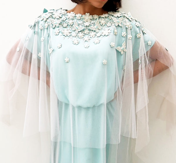RAMADAN18 TURQUOISE CREPE DRESS WITH TULLE CAPE AND FLORALEMBELISHMENT